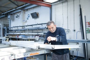 Hand-finishing aluminium bi-fold doors for precision