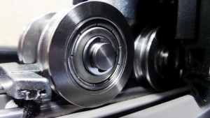 Stainless steel rollers for bi-folding doors
